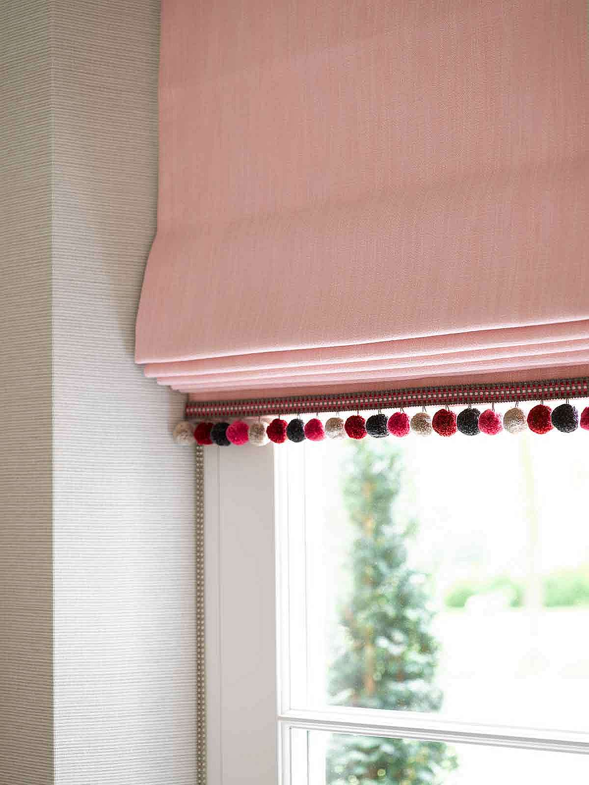 Interlined Roman blind with bobble trim to the hem