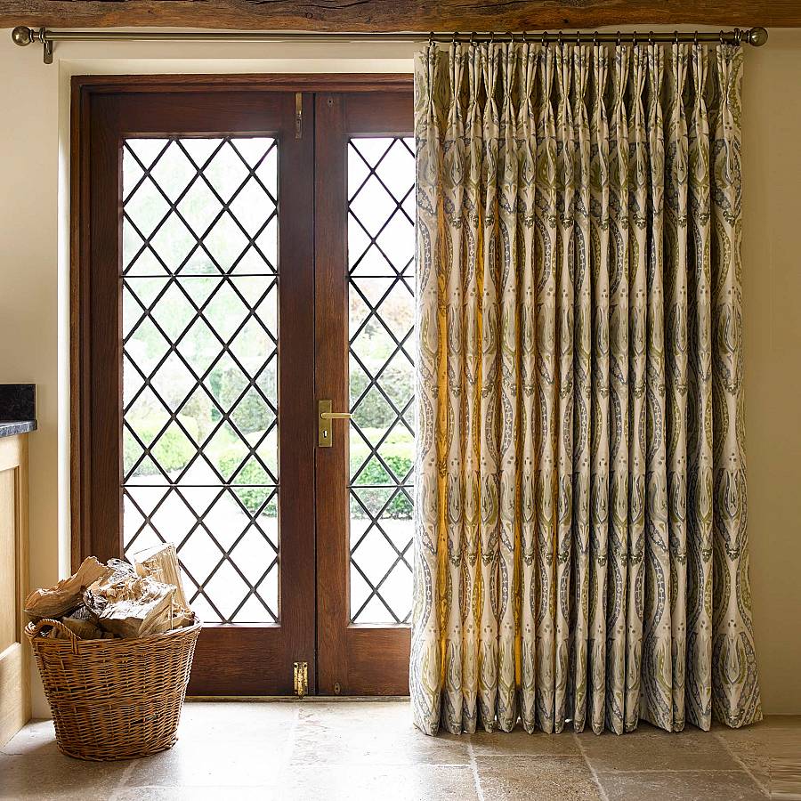 Photo of full length curtains in front of door